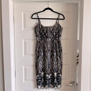 Stunning BCBGMaxazria midi dress.